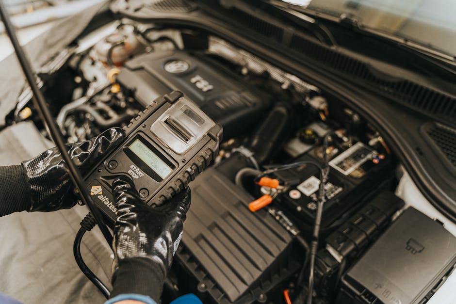 mechanic performing a pre-purchase inspection on a used car - used cars salt lake utah